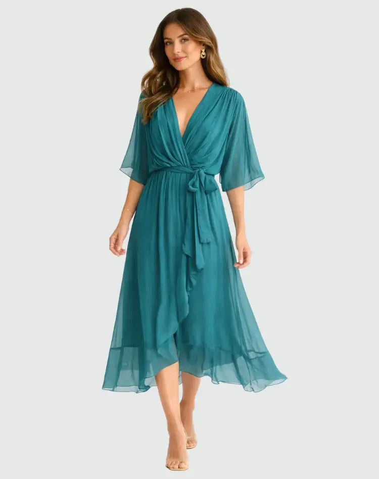 Alexandra | Women's Wrap Midi Dress with V-Neckline, Half-Length Sleeve Occasion Dress | The Dress Cellar | Purple
