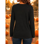 Hailey | Women's Halloween Graphic Long-Sleeve Top, Festive Crew Neck Top | The Dress Cellar | Khaki