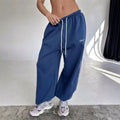 Maelle | Women's Baggy-Fit Sweatpants with Side Stripe, Wide-Leg Lounge Trousers | The Dress Cellar | Navy blue