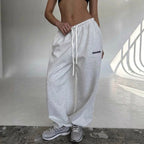 Maelle | Women's Baggy-Fit Sweatpants with Side Stripe, Wide-Leg Lounge Trousers | The Dress Cellar | Yellow