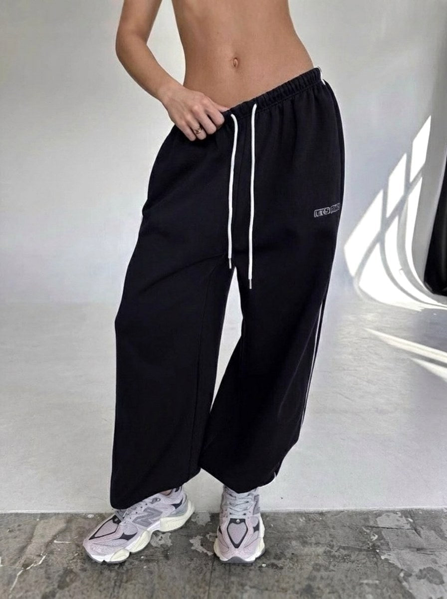 Maelle | Women's Baggy-Fit Sweatpants with Side Stripe, Wide-Leg Lounge Trousers | The Dress Cellar | Brown