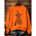 Megan | Women's Halloween Witch Graphic Sweatshirt, Relaxed Crew Neck Sweater | The Dress Cellar | Orange
